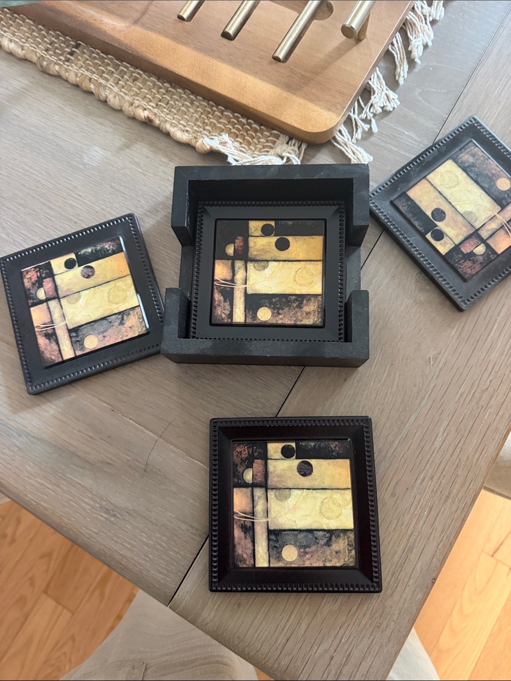 Set of Black Coasters with Abstract Yellow Art